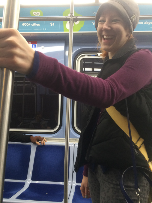Jenni made a less-than-excited transit face, but eventually couldn't contain her excitement to be riding with CTA! Eric's finger-less gloves make an appearance.