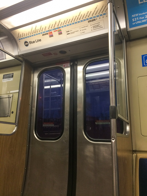 I took this photo on the Blue Line in hopes that the strip map would one day provide some historical insight. Until then, this is literally just a photo of two sliding doors.