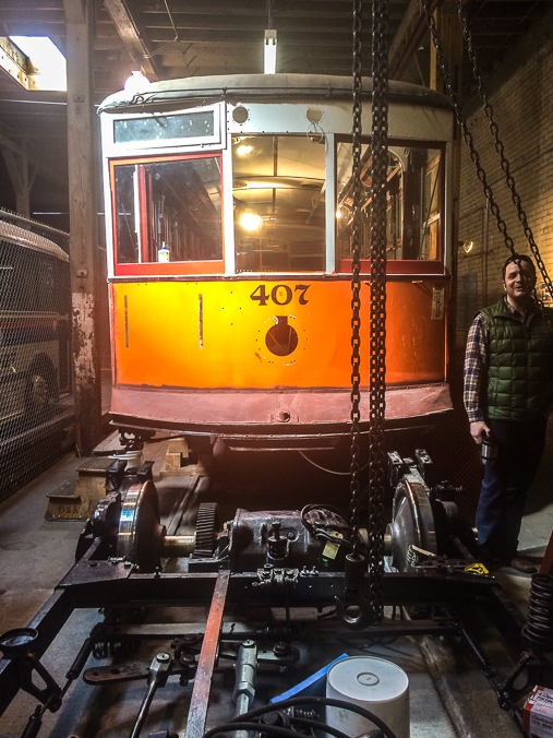 The body of Car 25 in restoration in the trolley barn. The "truck" or undercarriage is pictured in the foreground. Its current restoration as Charleston Car 407 was done by the SCANA Corporation of South Carolina. It was purchased by the Fort Collins Municipal Railway society in 2007.